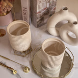 Vaso in ceramica rigato doppio fondo